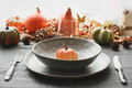 Thanksgiving day festive dinner decorated autumn leaves and pumpkins. - PhotoDune Item for Sale
