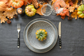 Thanksgiving day table setting with empty plate as mockup decorated fallen leaves, pumpkins. - PhotoDune Item for Sale