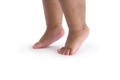 Baby feet standing on toes on white background - PhotoDune Item for Sale