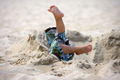 Child has fallen in a pit on the beach - PhotoDune Item for Sale