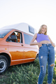 The happy girl has fun on a wonderful camping day. Van life concept. - PhotoDune Item for Sale