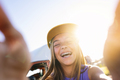 Beautiful teen girl taking selfies in a yellow cap and bracket on her teeth. - PhotoDune Item for Sale