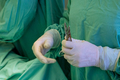 During surgical procedure surgeon hand was enclosed in pair of medical protective gloves - PhotoDune Item for Sale