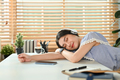 Young female freelancer sleeping at working desk. - PhotoDune Item for Sale