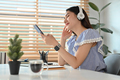 Shot of happy young woman holding smart phone and listening to music on headphone with closed eyes. - PhotoDune Item for Sale