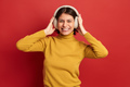 Excited woman listening to music - PhotoDune Item for Sale