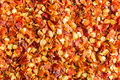 Dry chili pepper flakes. Crushed red peppers. Top view. - PhotoDune Item for Sale