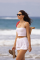 Summer Smile: Walking Young Asian-Caucasian Woman During Beach Vacation - PhotoDune Item for Sale