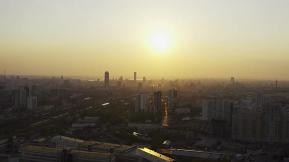 Aerial View of the Bright Orange Sunset Over the City.