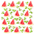 Juicy watermelon slices and mint leaves arranged in a pattern isolated on white background - PhotoDune Item for Sale