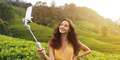Asian Travel Vlogger Woman with Mobile Phone Camera During Trip to Green Tea Hills in Sri Lanka. - PhotoDune Item for Sale