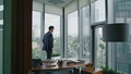 Entrepreneur looking office window. Smart businessman thinking business ideas. - PhotoDune Item for Sale
