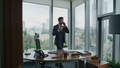Annoyed entrepreneur talking phone gesturing emotionally standing modern office - PhotoDune Item for Sale