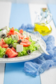 Diet and tasty Greek salad with lettuce, tomatoes and onion. - PhotoDune Item for Sale