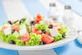 Delicious and homemade Greek salad with olives, feta and lettuce. - PhotoDune Item for Sale