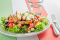 Tasty and homemade Caesar salad with chicken, lettuce and tomatoes. - PhotoDune Item for Sale