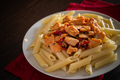 Penne pasta with chicken and vegetables in tomato sauce - PhotoDune Item for Sale
