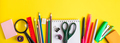 Back to school concept. Flat lay of office supplies on yellow background. Place for text. - PhotoDune Item for Sale