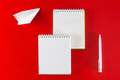 Office supplies on a red background. - PhotoDune Item for Sale