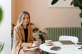 Portrait of a business woman drinking morning coffee - PhotoDune Item for Sale