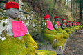 Row of ancient stone statues in Japan - PhotoDune Item for Sale