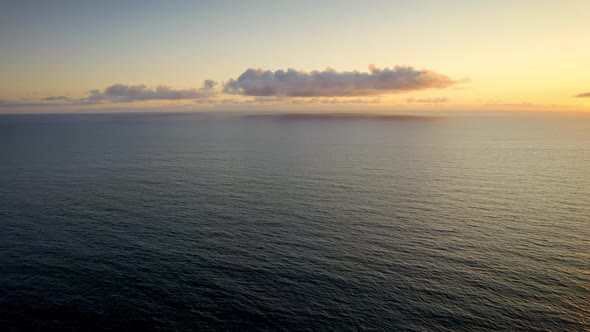 Beautiful Drone View Sunset Over Sea Ocean Waves Crashing on Beach