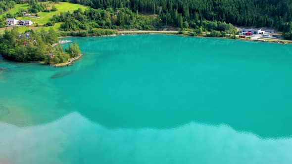 Stunning Lake with turquoise color water with green lawns