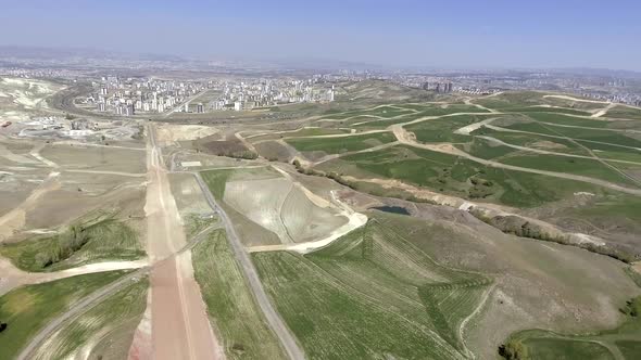 Land Development and Urban City Planning in New Suburban Complex with Developing Infrastructure