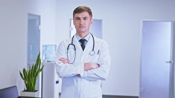 Portrait of a Man Doctors with a Serious Face in