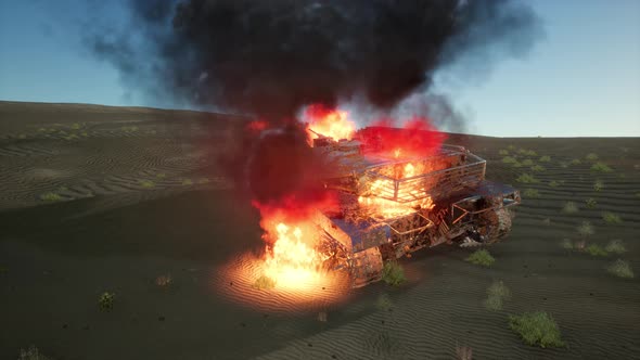 Burned Tank in the Desert at Sunset