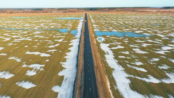 Aerial View Of Early Spring With Puddles Of Water In Fields