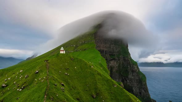 Timelapse of Kalsoy Island and Kallur Lighthouse at Cloudy Day