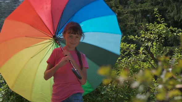With parasol in the sun.  alt