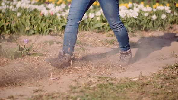 Farmer Walking on Dirt at Farm