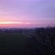 Aerial Footage By a Drone Flying Low Over a Beautiful Sunset Farm Field Warm Light Sun - VideoHive Item for Sale