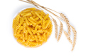 Raw Pasta Fusilli In Bowl And Wheat Spikelets Isolated On White Background - PhotoDune Item for Sale
