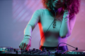 Closeup of young woman as DJ making music - PhotoDune Item for Sale