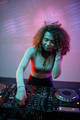 Vertical portrait of young woman as DJ - PhotoDune Item for Sale