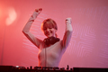 Young woman as female DJ at disco party in neon light - PhotoDune Item for Sale
