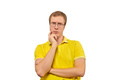 Young doubting man in glasses, man in yellow T-shirt isolated on white background - PhotoDune Item for Sale