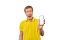 Smiling young man with smartphone mockup in hand, white isolated background, mobile app advertise - PhotoDune Item for Sale