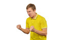 Aggressive angry man in yellow T-shirt ready to fight with fists isolated on white background - PhotoDune Item for Sale