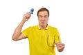 Angry gamer with wireless gamepad dressed in yellow T-shirt isolated on white background - PhotoDune Item for Sale