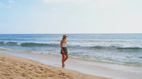 Woman Walking on The Beach 4k