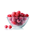 Frozen raspberries in a plate on a white background.Healthy food. Generated AI. - PhotoDune Item for Sale