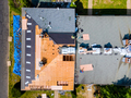 An apartment building roof was repaired by replacing old roof with new shingles - PhotoDune Item for Sale