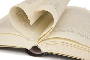 Open book with heart shaped pages. Love for reading