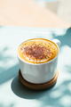 Top view of cup cappuccino coffee decorated with powder - PhotoDune Item for Sale