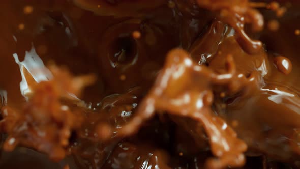 Super Slow Motion Shot of Splashing Coffee From Top Shot at 1000 Fps.