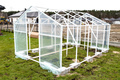 Assembling a home greenhouse from an aluminum frame and thick foil. - PhotoDune Item for Sale